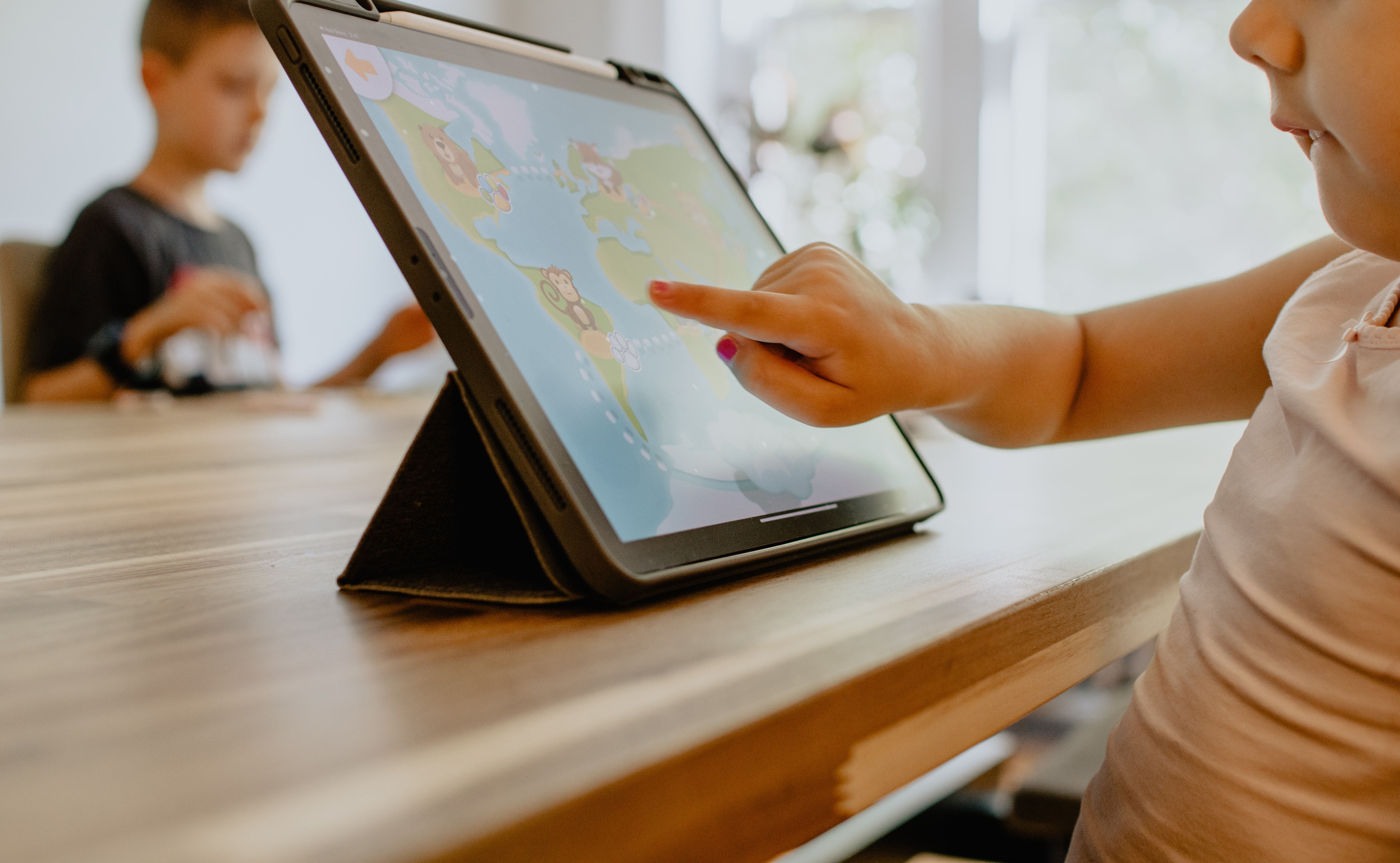 toddler working in a tablet