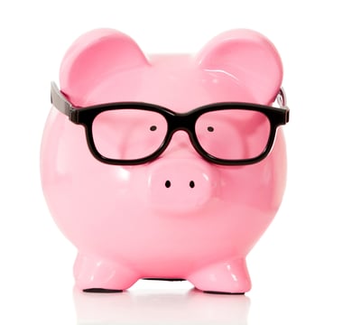 Geeky piggybank with glasses - isolated over a white background-1
